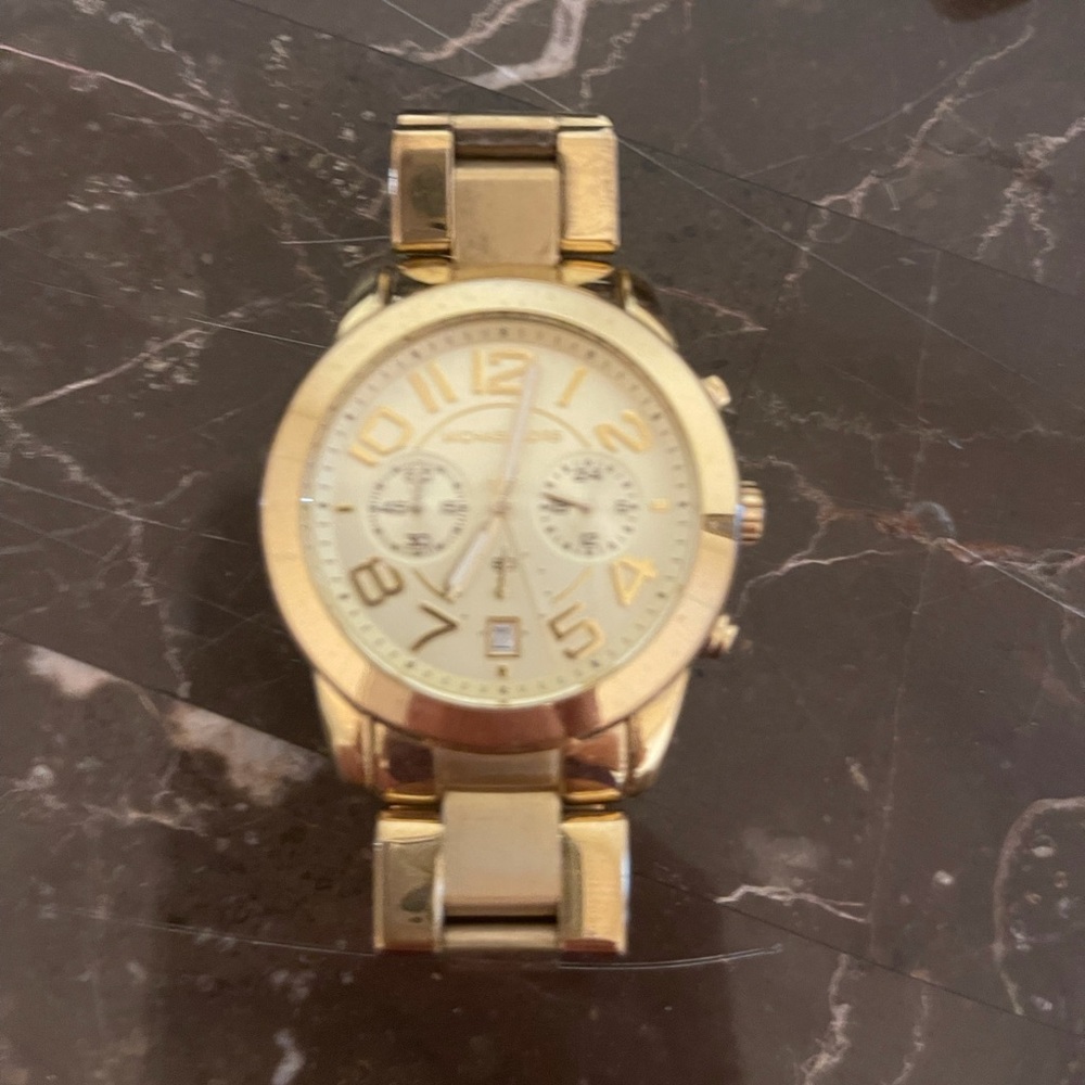 Michael Kors gold colored ladies watch